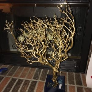 Gold manzanita branches with fairy lights and base